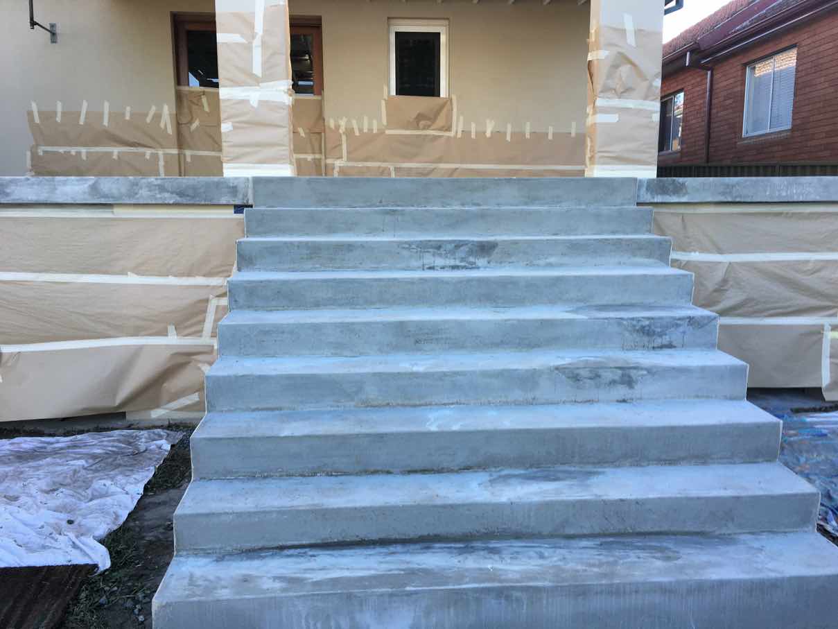 Front entry concrete steps of a Parramatta home prepared and washed back before spray crete
