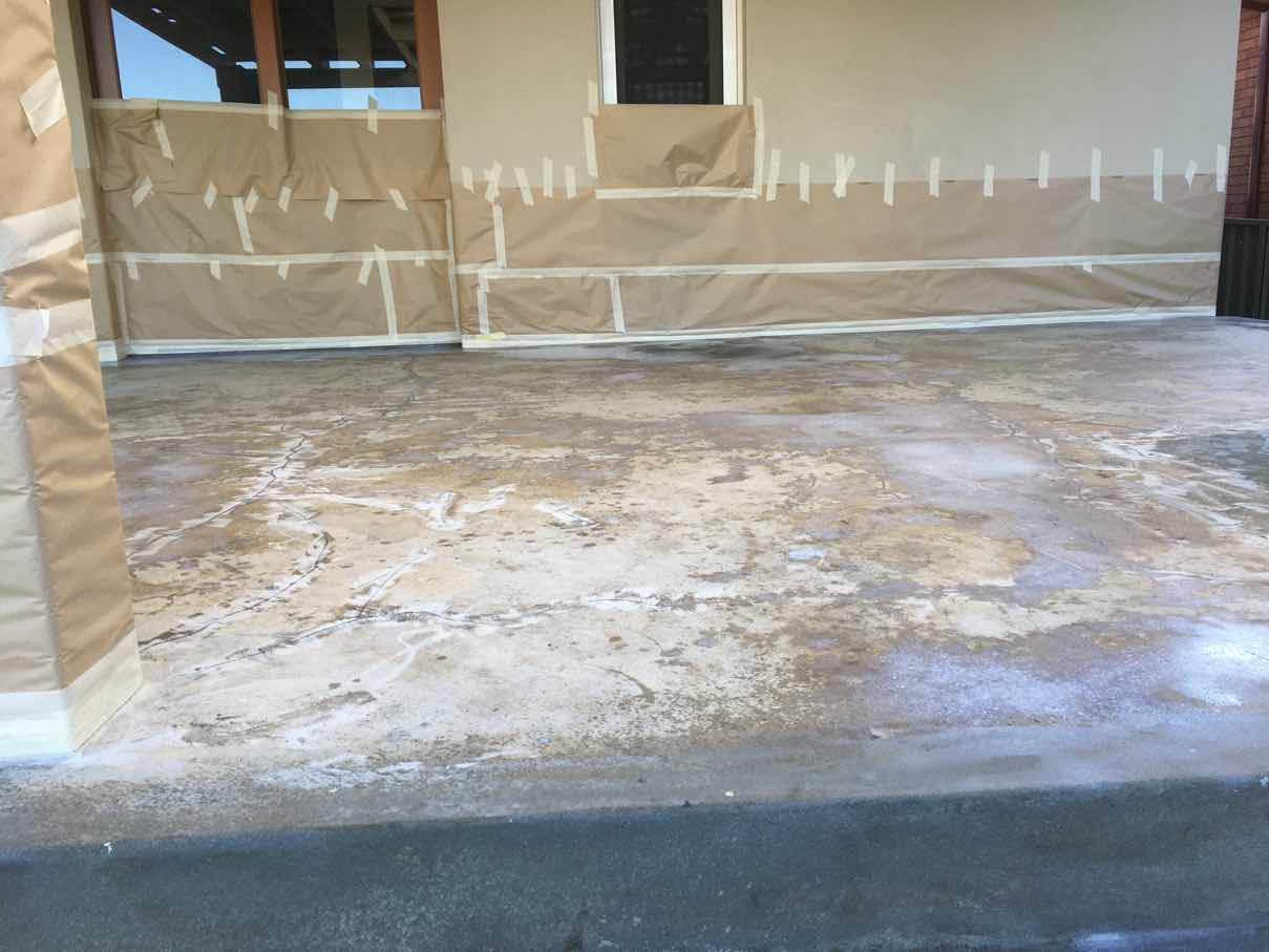 Parramatta patio concrete after acid etching and surface profiling with surrounding walls masked