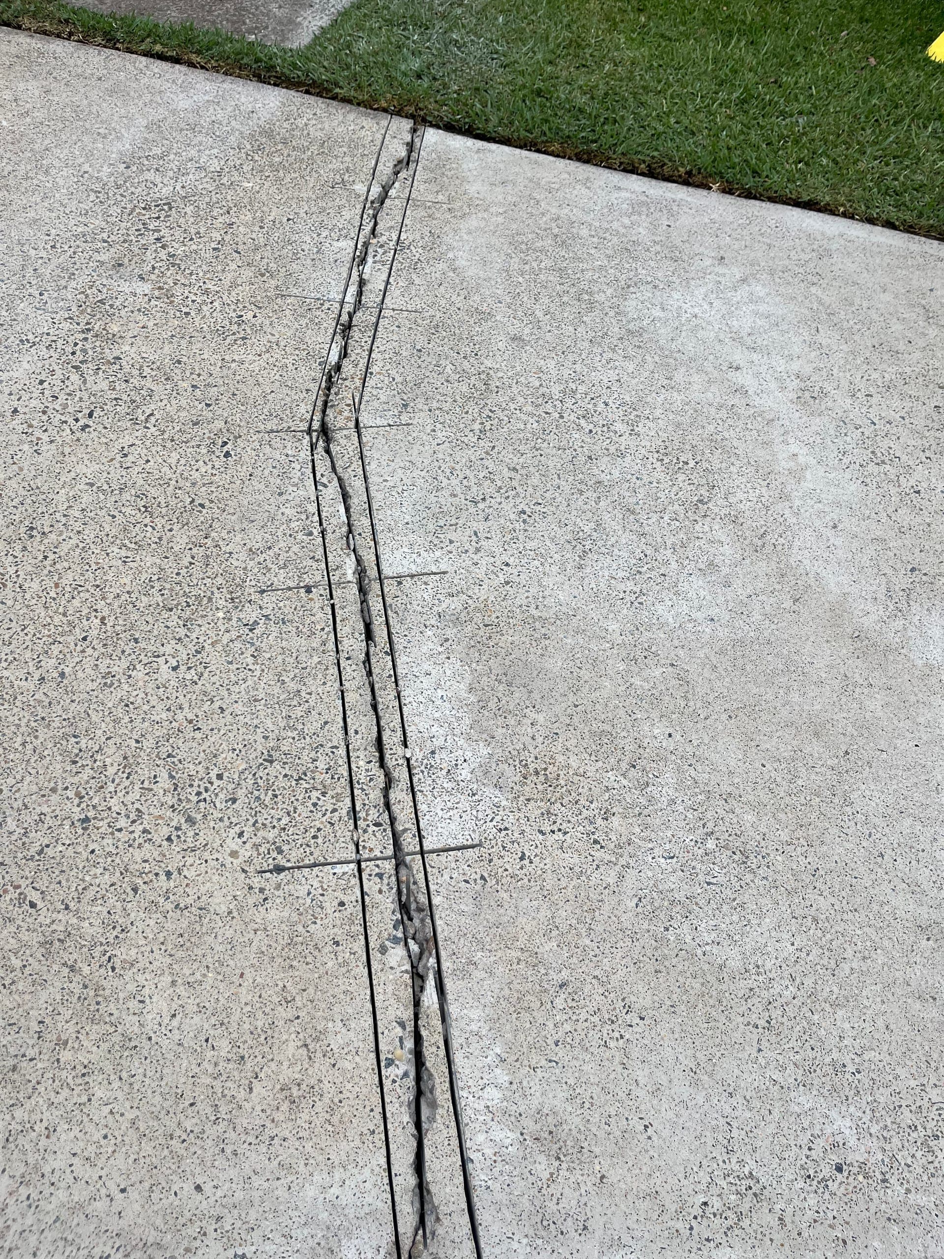Controlled repair cuts beside grass