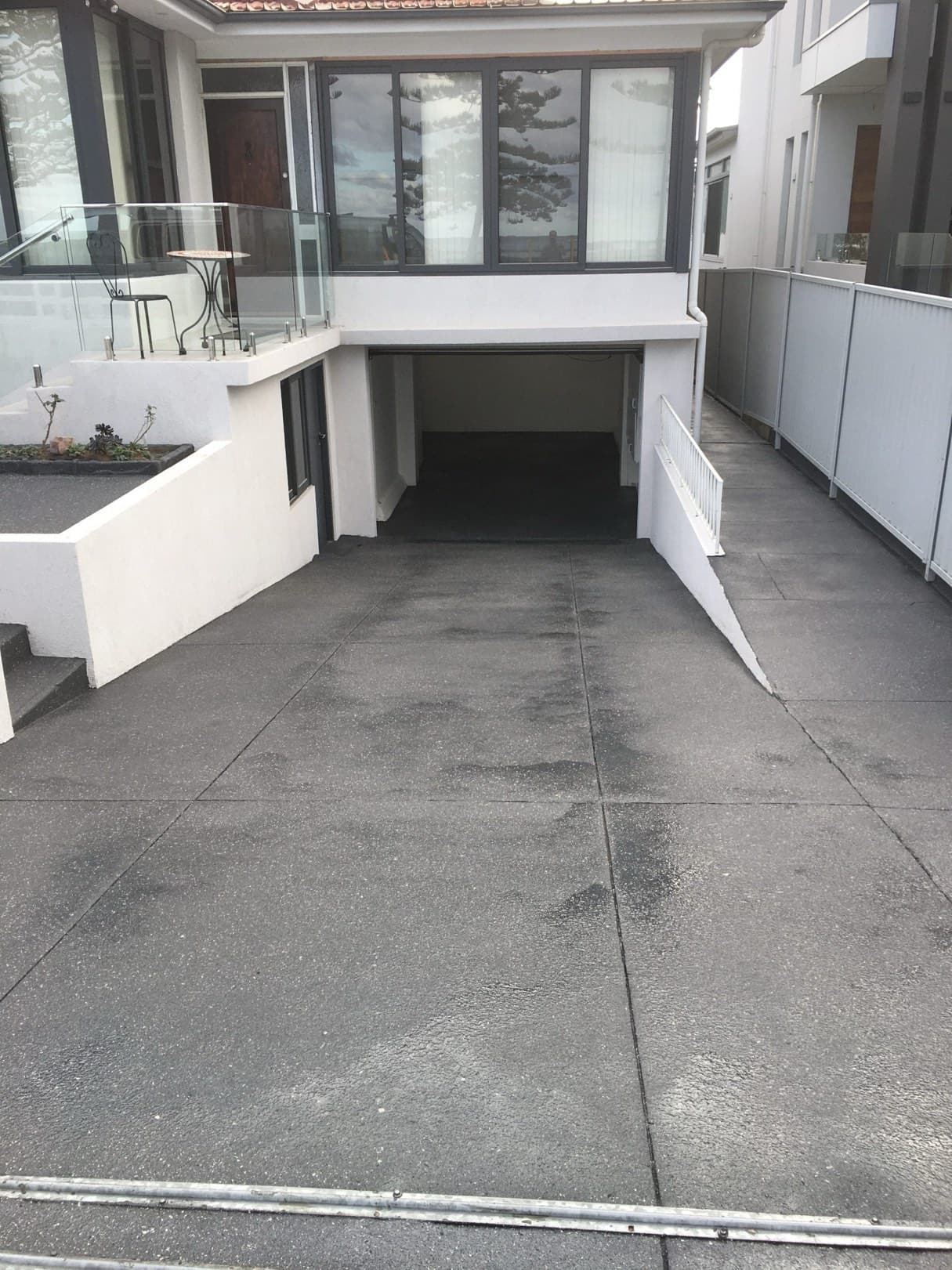 Finished charcoal concrete resurfacing driveway in Sydney