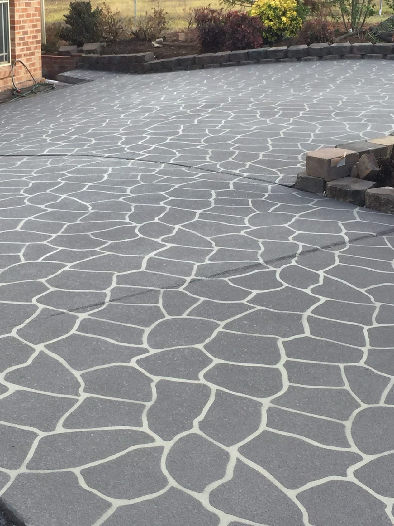 Stencil decorative concrete resurfacing finish