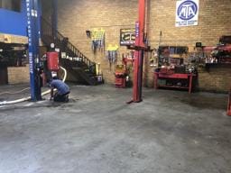 Workshop concrete floor before DaniCrete epoxy installation