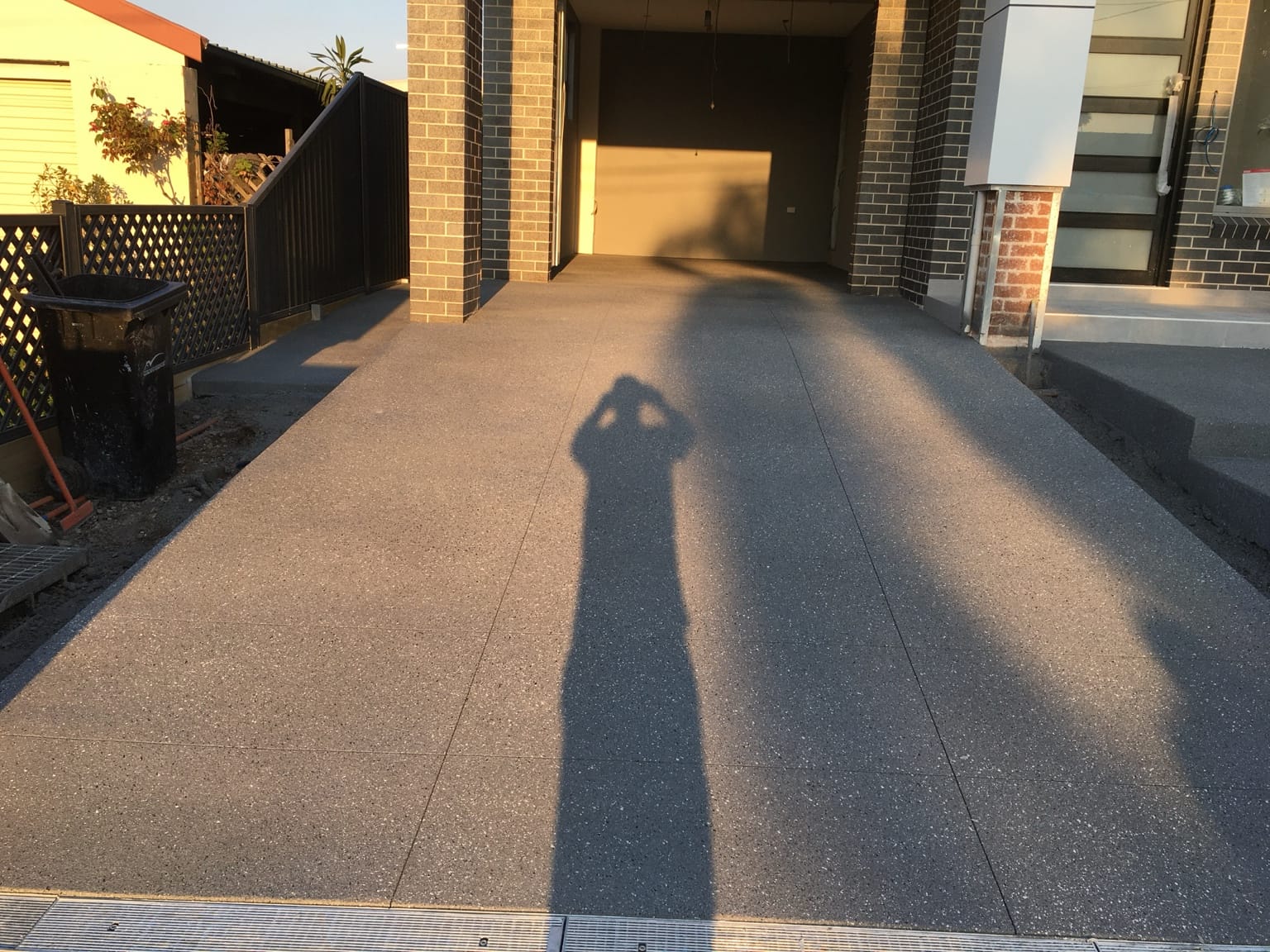 Same Lidcombe black-house driveway after Spray Crete resurfacing, angle one