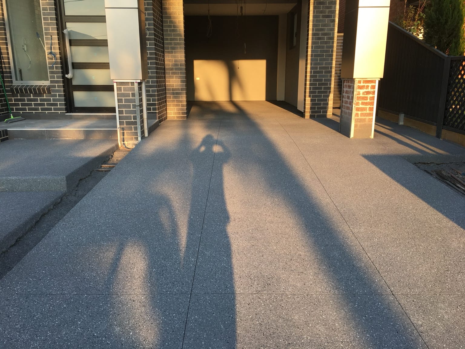 Black brick Lidcombe driveway after resurfacing angle two